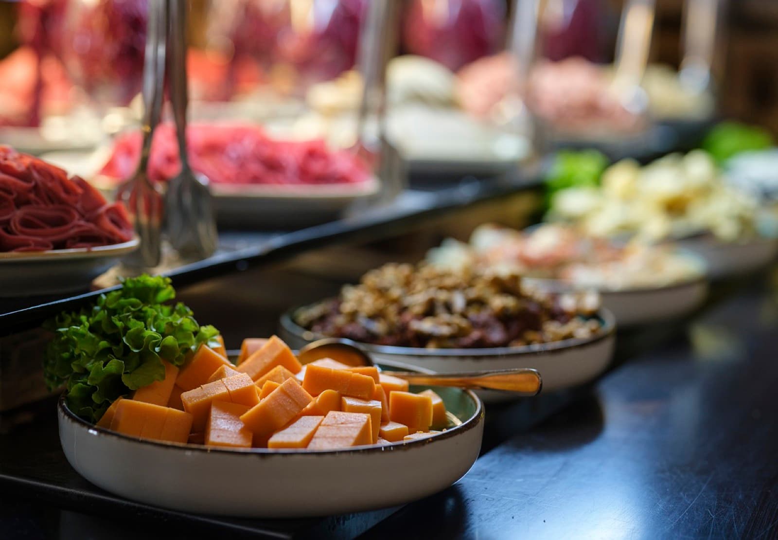 Breakfast buffet dishes with cheeses and cold cuts at the Hotel Dora Istanbul restaurant